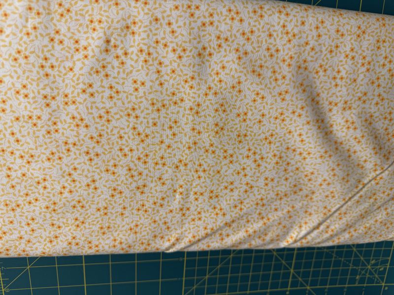 Oransje, gule små blomster